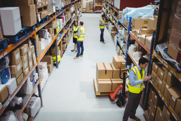 warehouse-worker-using-hand-scanner-warehouse_107420-13723